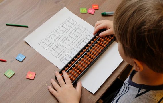 Child learning abacus